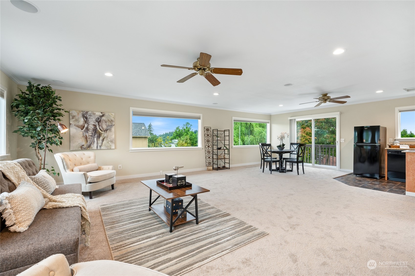 914 North 33rd Street Renton, WA 98056 - Photo 23 of 37 a living room with furniture and a large window