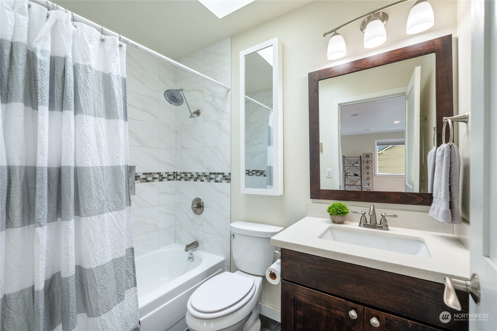 914 North 33rd Street Renton, WA 98056 - Photo 29 of 37 a bathroom with a sink a toilet and shower