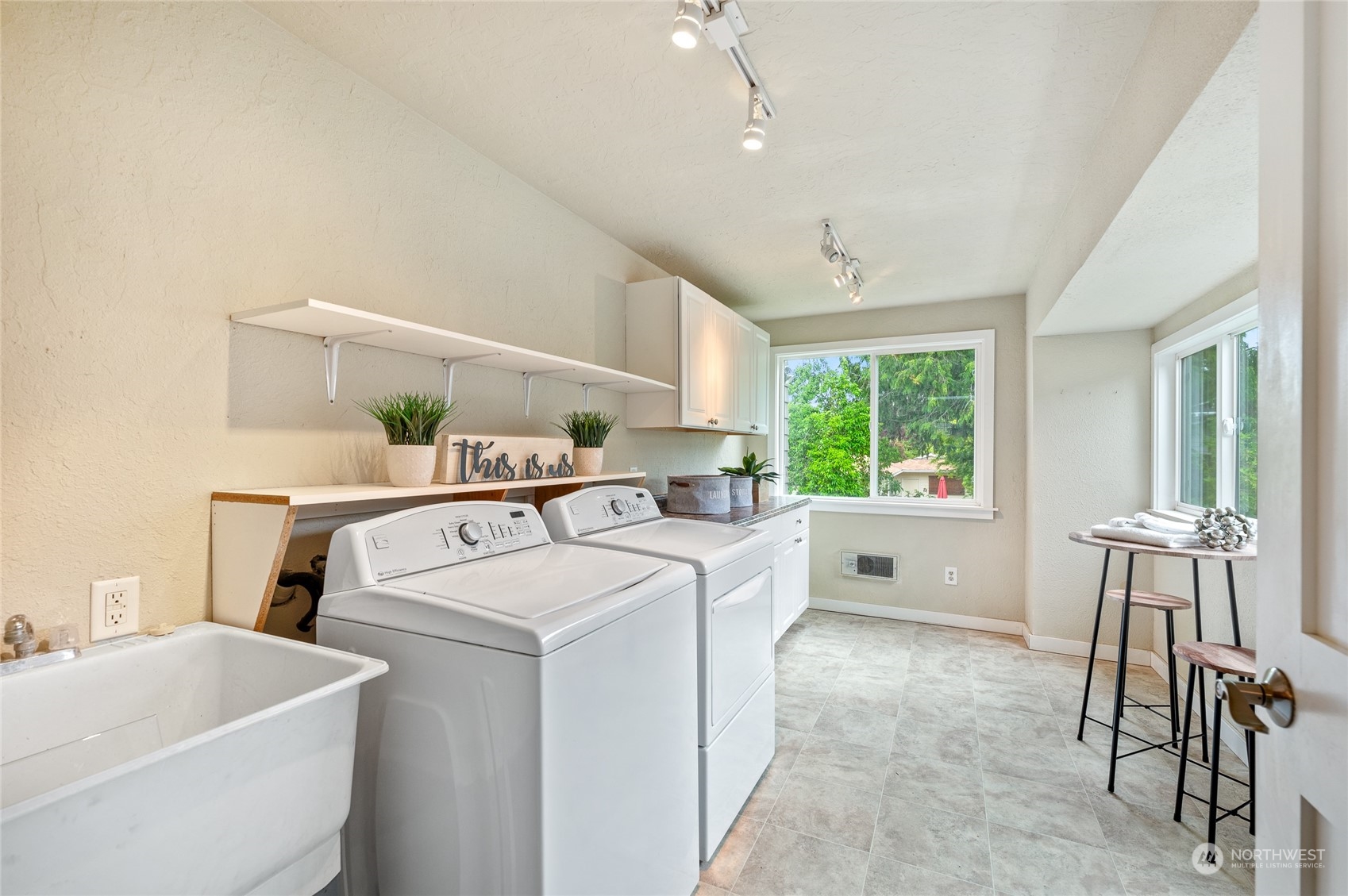 914 North 33rd Street Renton, WA 98056 - Photo 30 of 37 a room with storage and utility