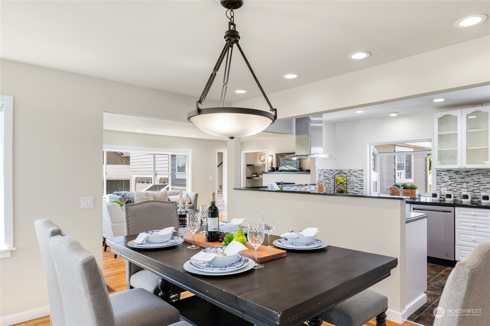 914 North 33rd Street Renton, WA 98056 - Photo 8 of 37 a open dining room with furniture and window