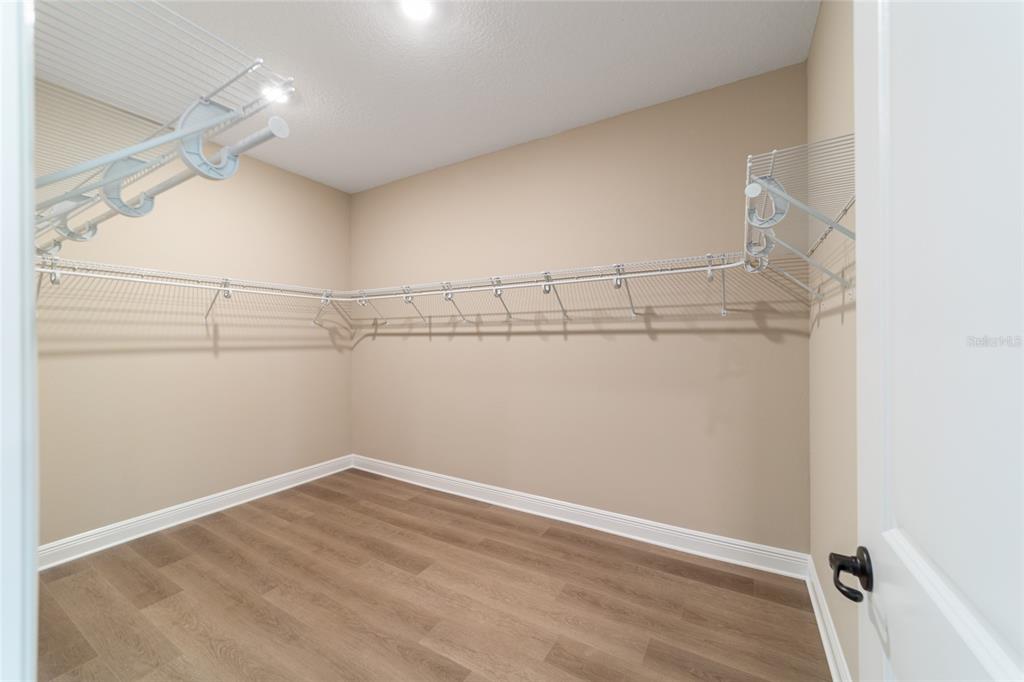 10537 Southwest 96th Lane Road Ocala, FL 34481 - Photo 51 of 75 a view of a room with racks on the wall