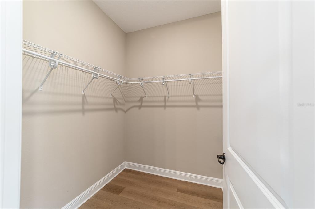 10537 Southwest 96th Lane Road Ocala, FL 34481 - Photo 56 of 75 a view of a room with racks on the wall