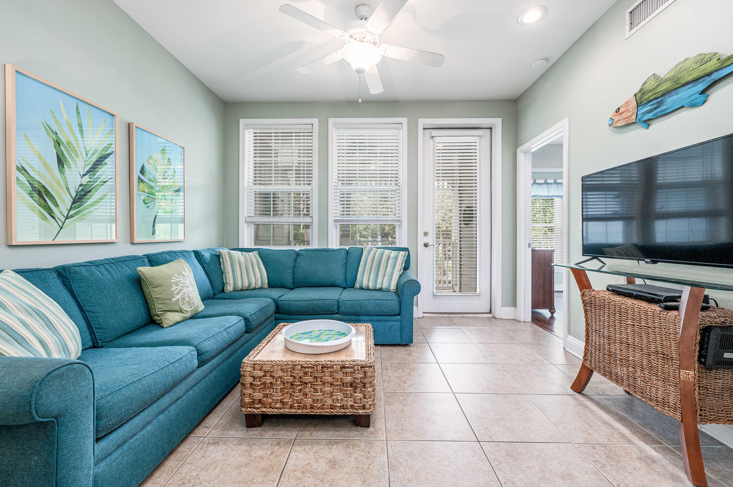 104 Village Boulevard, Unit 621 Santa Rosa Beach, FL 32459 - Photo 20 of 49 a living room with furniture and a flat screen tv