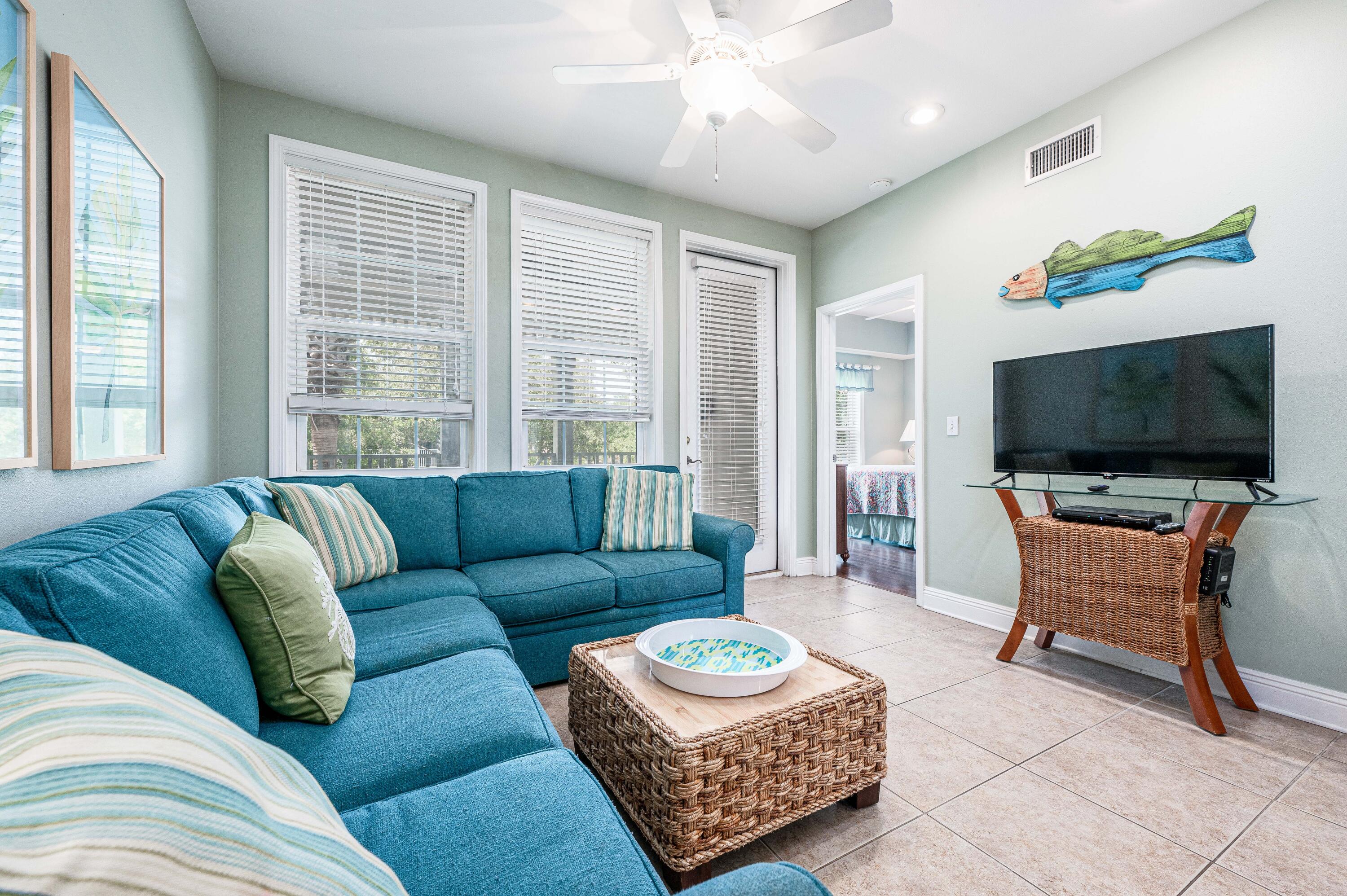 104 Village Boulevard, Unit 621 Santa Rosa Beach, FL 32459 - Photo 25 of 49 a living room with furniture and a flat screen tv