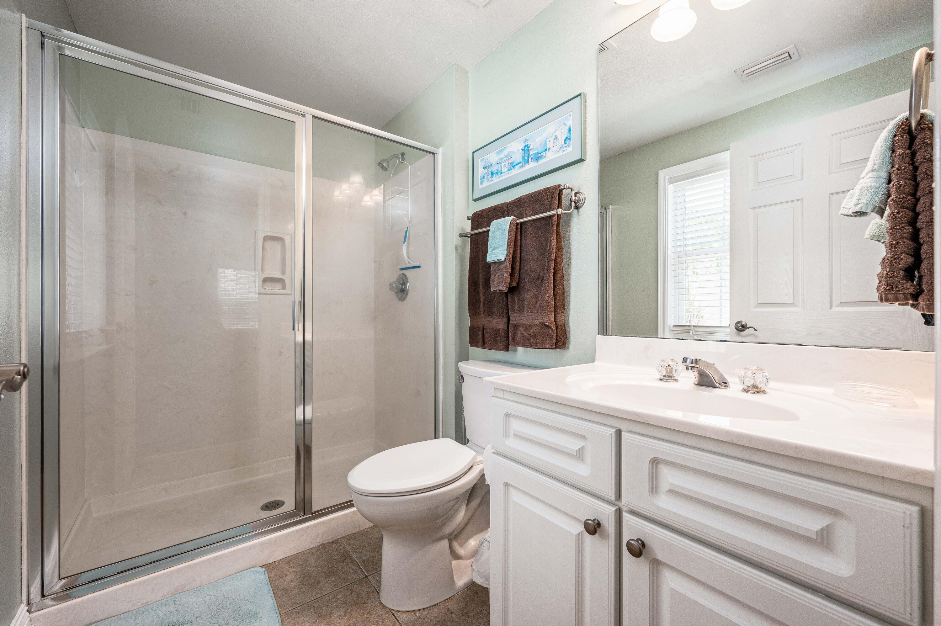 104 Village Boulevard, Unit 621 Santa Rosa Beach, FL 32459 - Photo 29 of 49 a bathroom with a sink toilet and shower