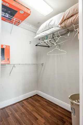 a view of a room with racks on the wall