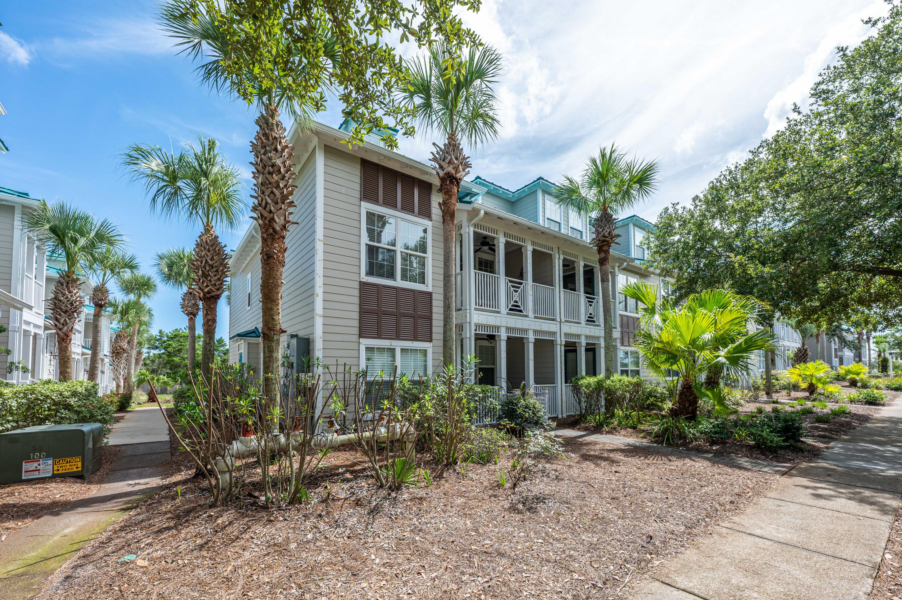104 Village Boulevard, Unit 621 Santa Rosa Beach, FL 32459 - Photo 3 of 49 a front view of a house with garden