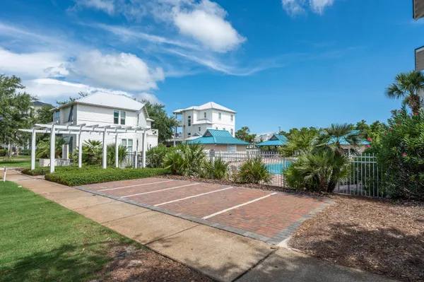 a view of a building with a yard