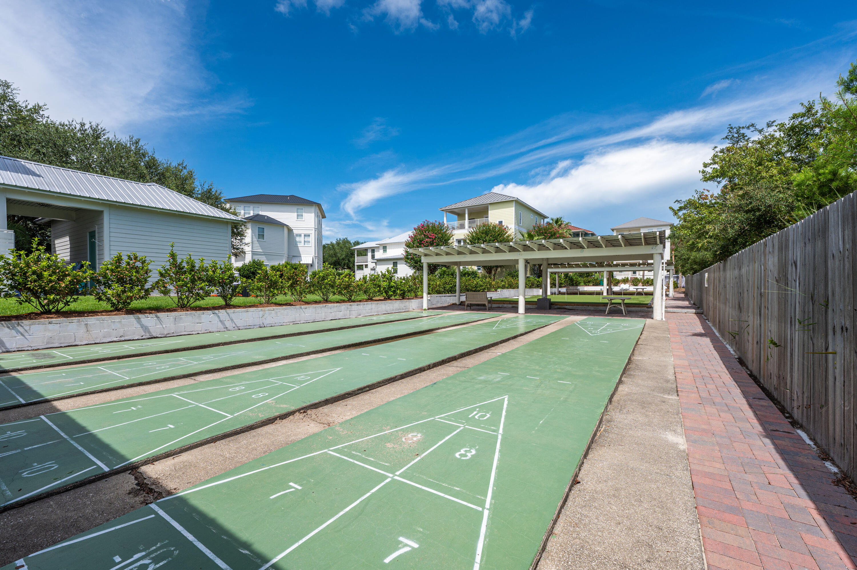 104 Village Boulevard, Unit 621 Santa Rosa Beach, FL 32459 - Photo 37 of 49 a view of a big house with a big yard and potted plants