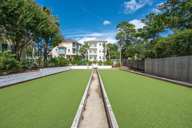 a view of swimming pool with a backyard