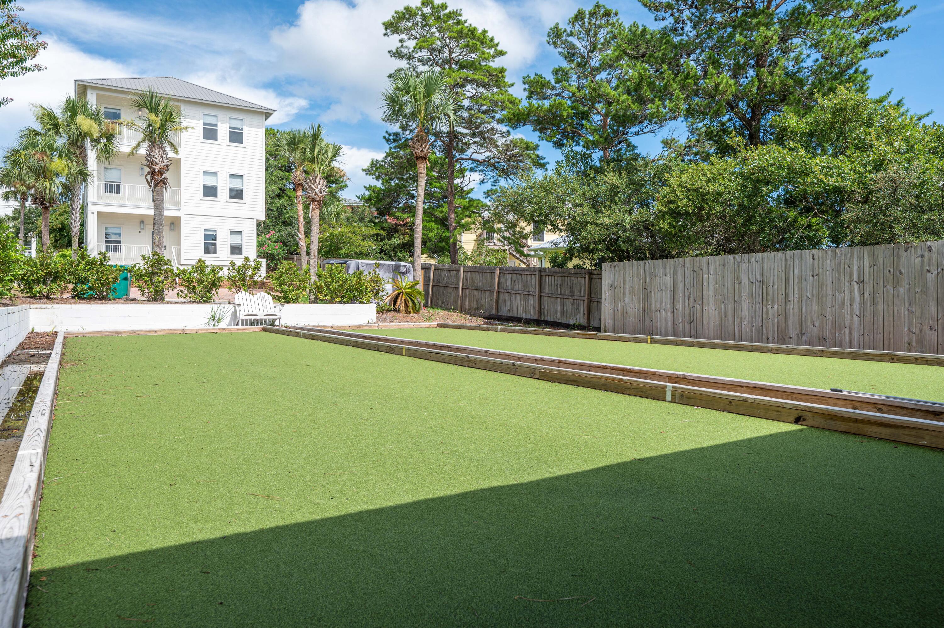 104 Village Boulevard, Unit 621 Santa Rosa Beach, FL 32459 - Photo 43 of 49 a swimming pool with outdoor seating and yard