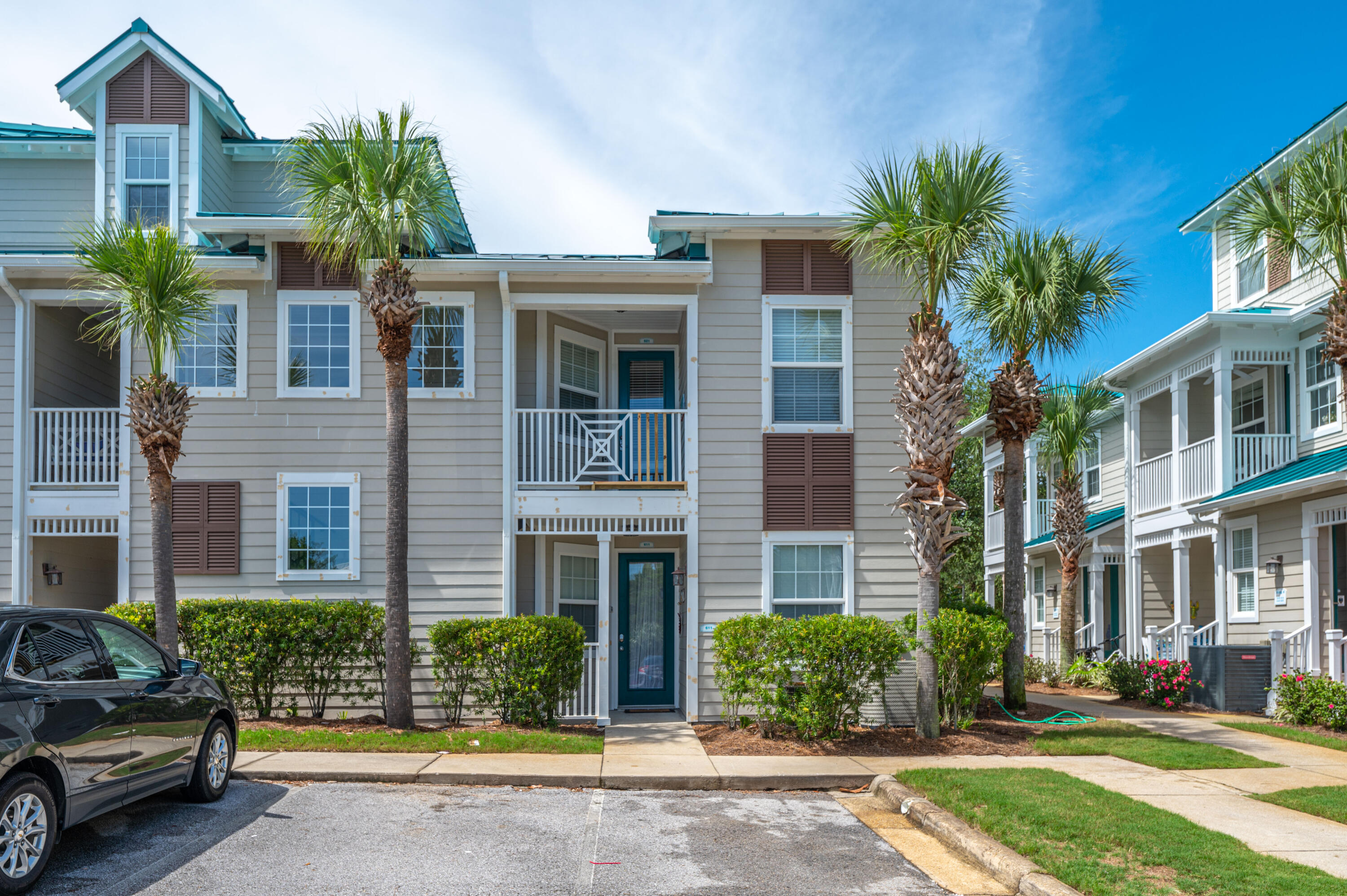 104 Village Boulevard, Unit 621 Santa Rosa Beach, FL 32459 - Photo 5 of 49 a front view of a house with a yard