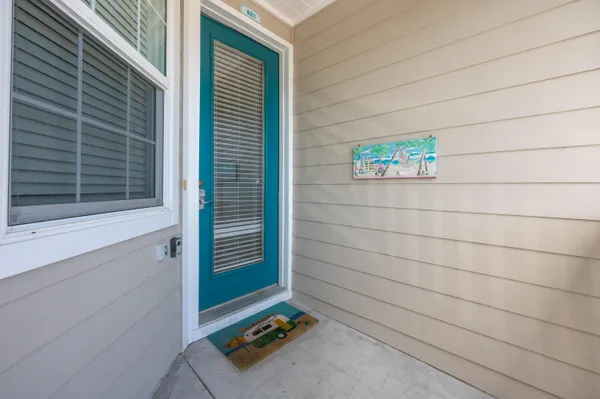a view of a door and a window