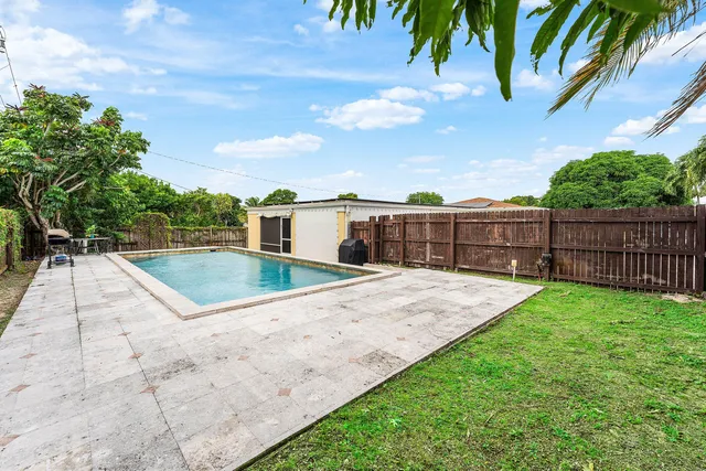 a view of a backyard with a garden