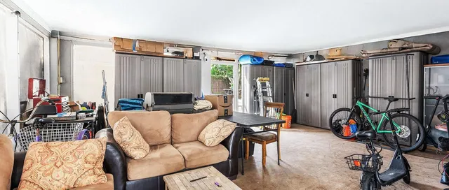 an aerial view of a house with a garden