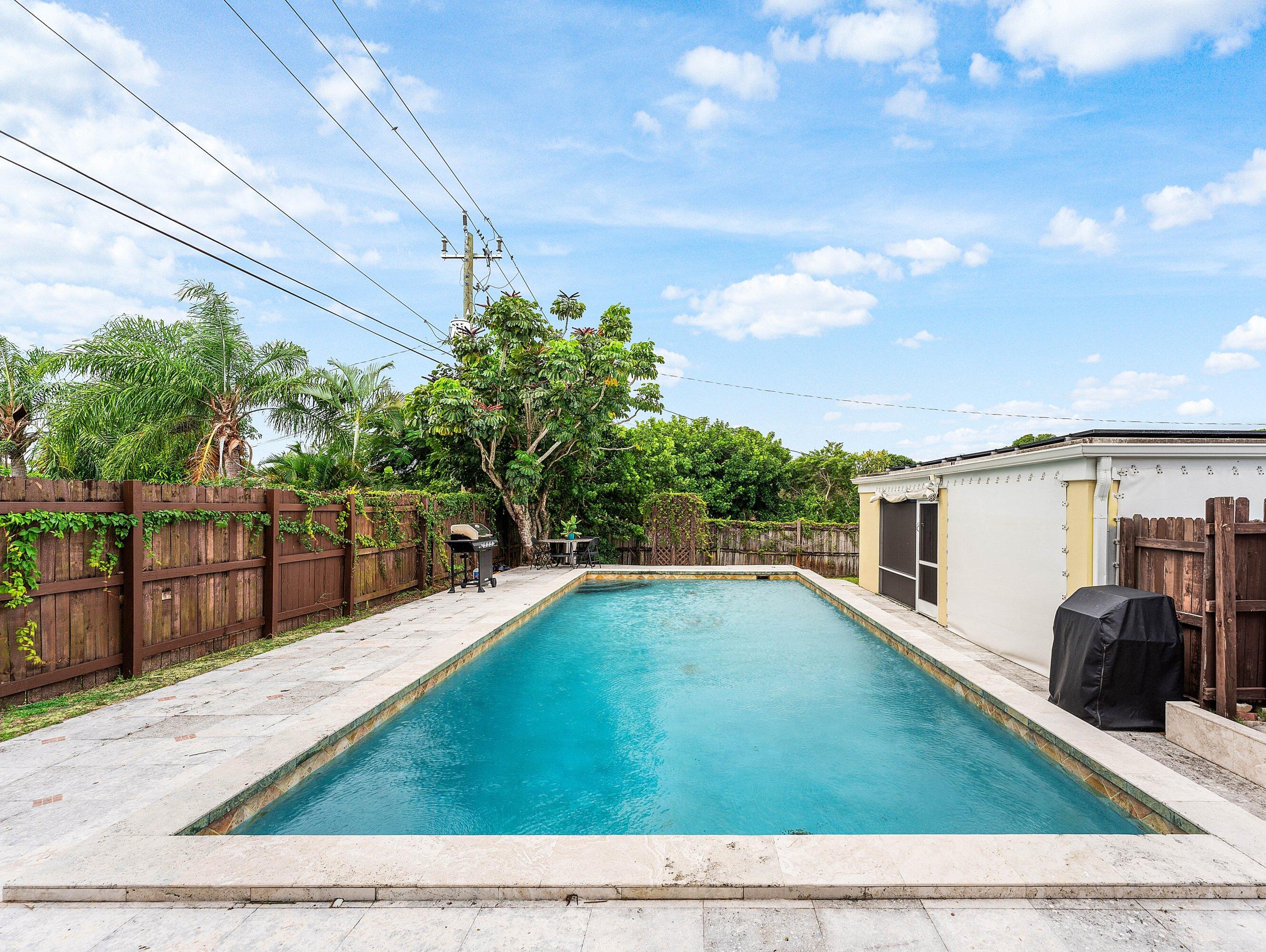 305 Southwest 3rd Street Boynton Beach, FL 33435 - Photo 4 of 36 a view of a backyard