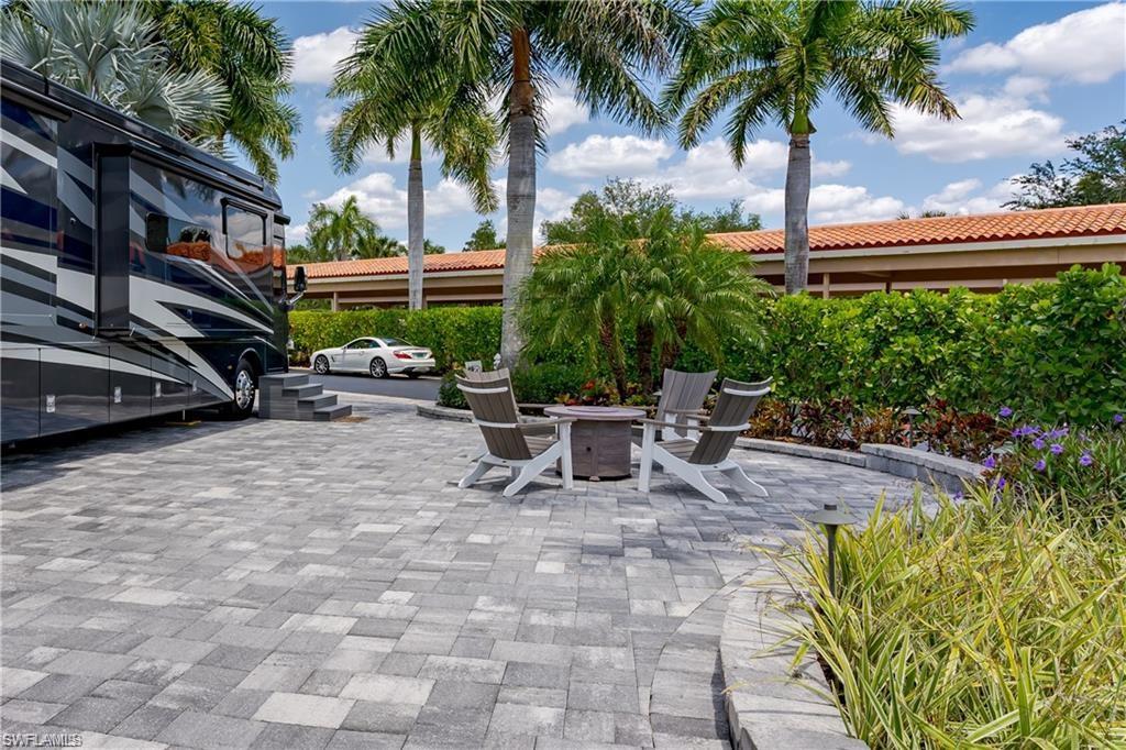 13526 Snook Circle Naples, FL 34114 - Photo 14 of 36 a view of outdoor space yard and porch