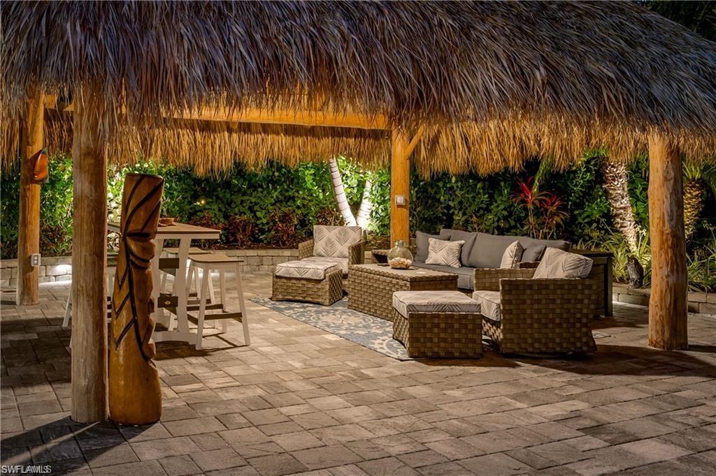 13526 Snook Circle Naples, FL 34114 - Photo 25 of 36 a view of outdoor space with seating area