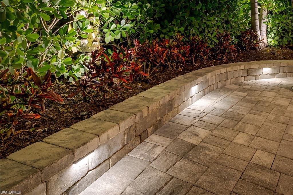 13526 Snook Circle Naples, FL 34114 - Photo 27 of 36 a view of a yard with some plants