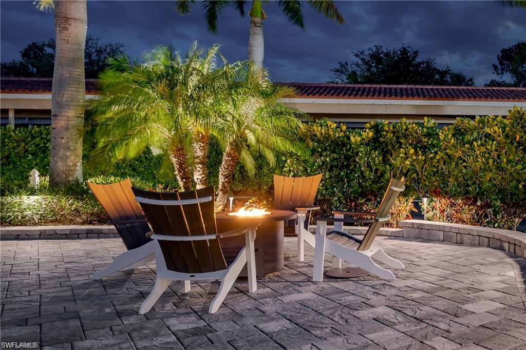 13526 Snook Circle Naples, FL 34114 - Photo 31 of 36 a view of outdoor space with seating area