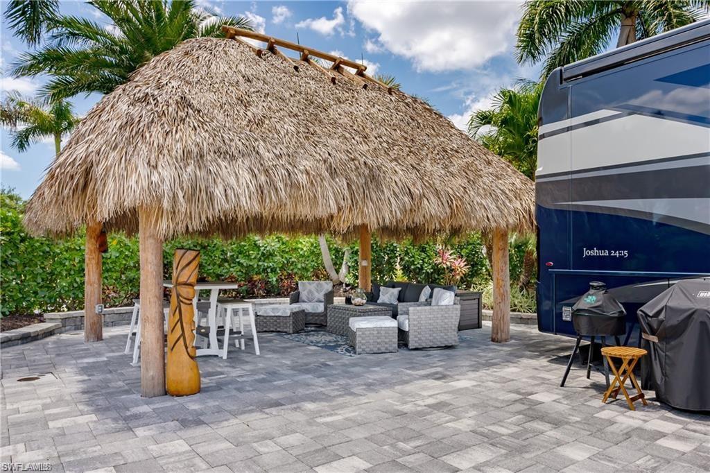 13526 Snook Circle Naples, FL 34114 - Photo 6 of 36 a view of outdoor space with seating