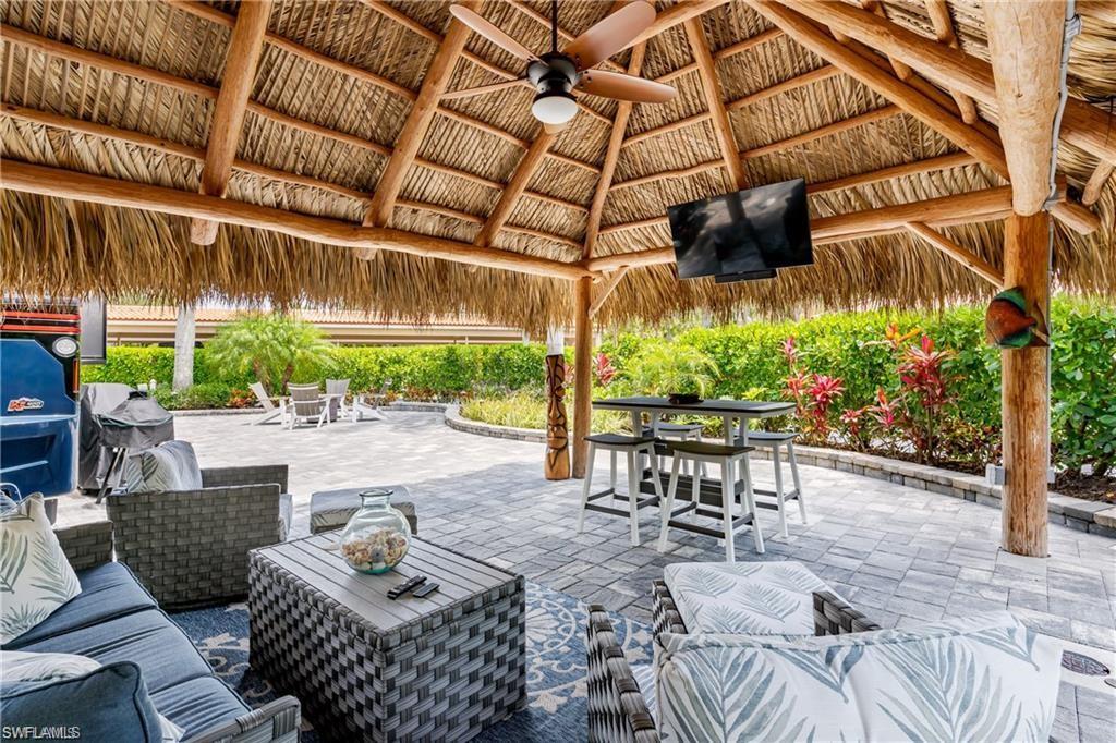 13526 Snook Circle Naples, FL 34114 - Photo 7 of 36 a view of yard with patio