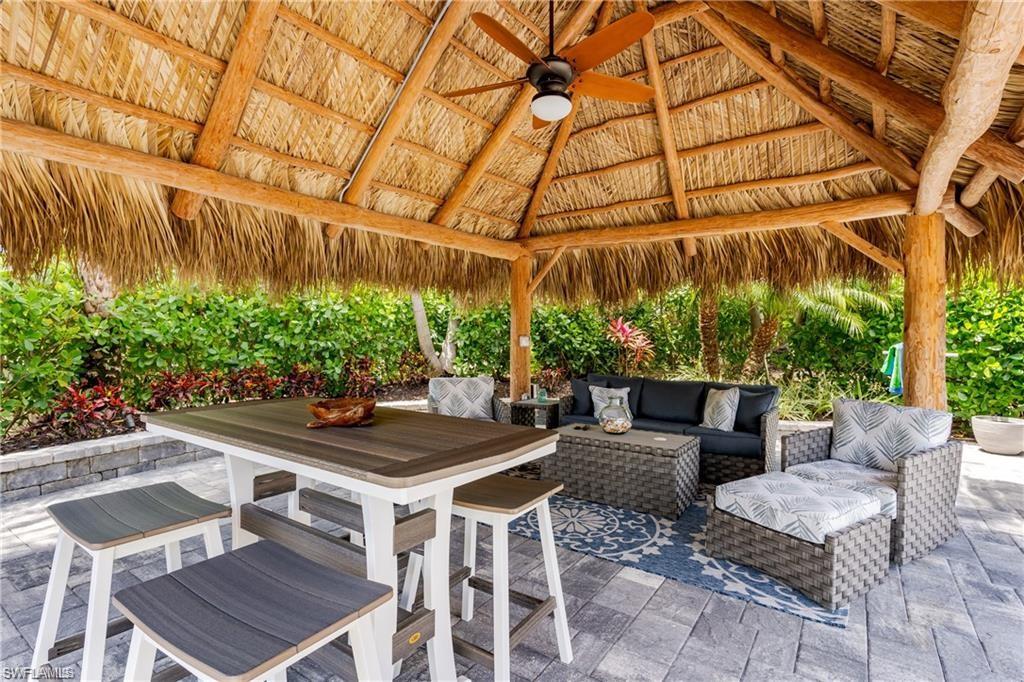 13526 Snook Circle Naples, FL 34114 - Photo 9 of 36 a view of outdoor space yard and patio