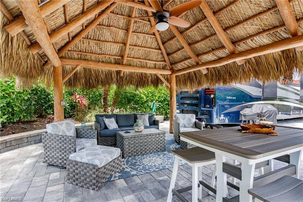 13526 Snook Circle Naples, FL 34114 - Photo 10 of 36 a view of outdoor space yard and patio