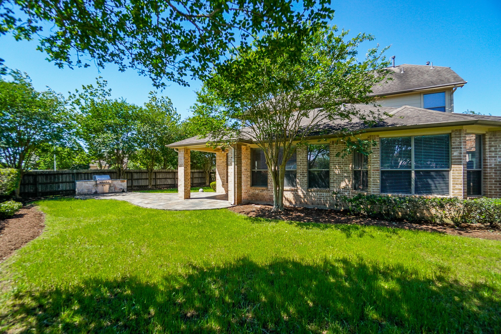 2335 Ralston Branch Way Sugar Land, TX 77479 - Photo 46 of 47 a view of a house with a yard and sitting area