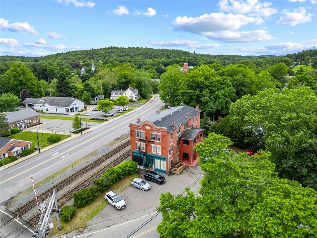 4 Davis Street Shirley, MA 01464 - Photo 5 of 18 an aerial view of a house with a garden