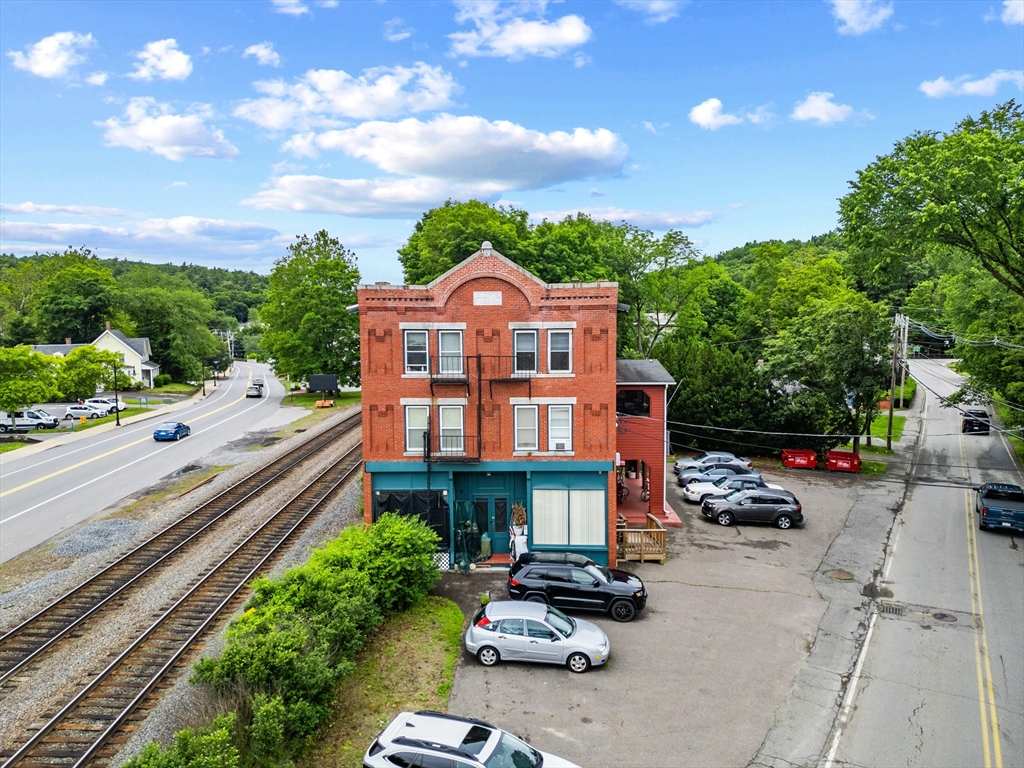 4 Davis Street Shirley, MA 01464 - Photo 6 of 18 a car parked on the side of the road