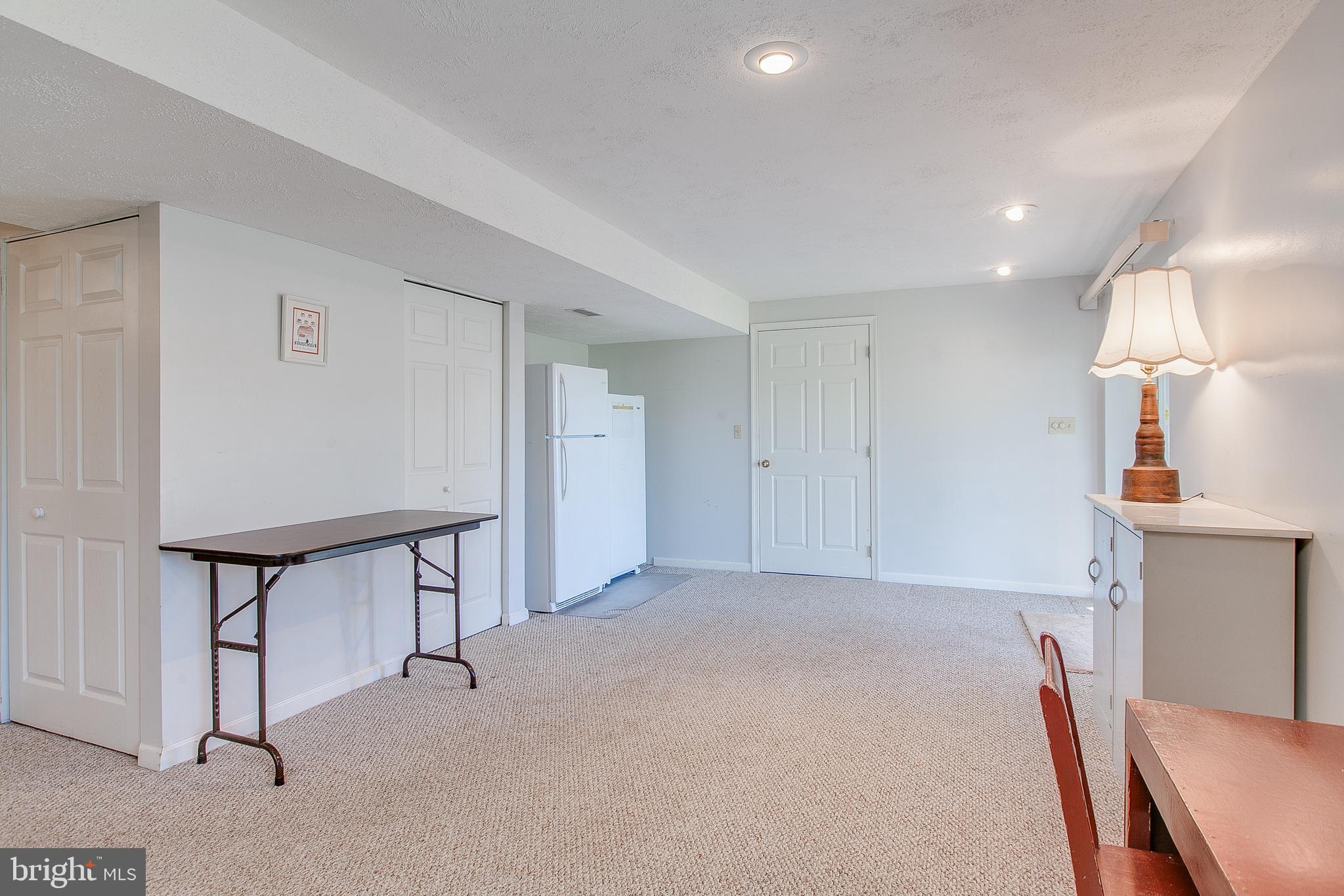 890 4 Seasons Road Westminster, MD 21157 - Photo 32 of 49 Finished basement w/full bath & storage room