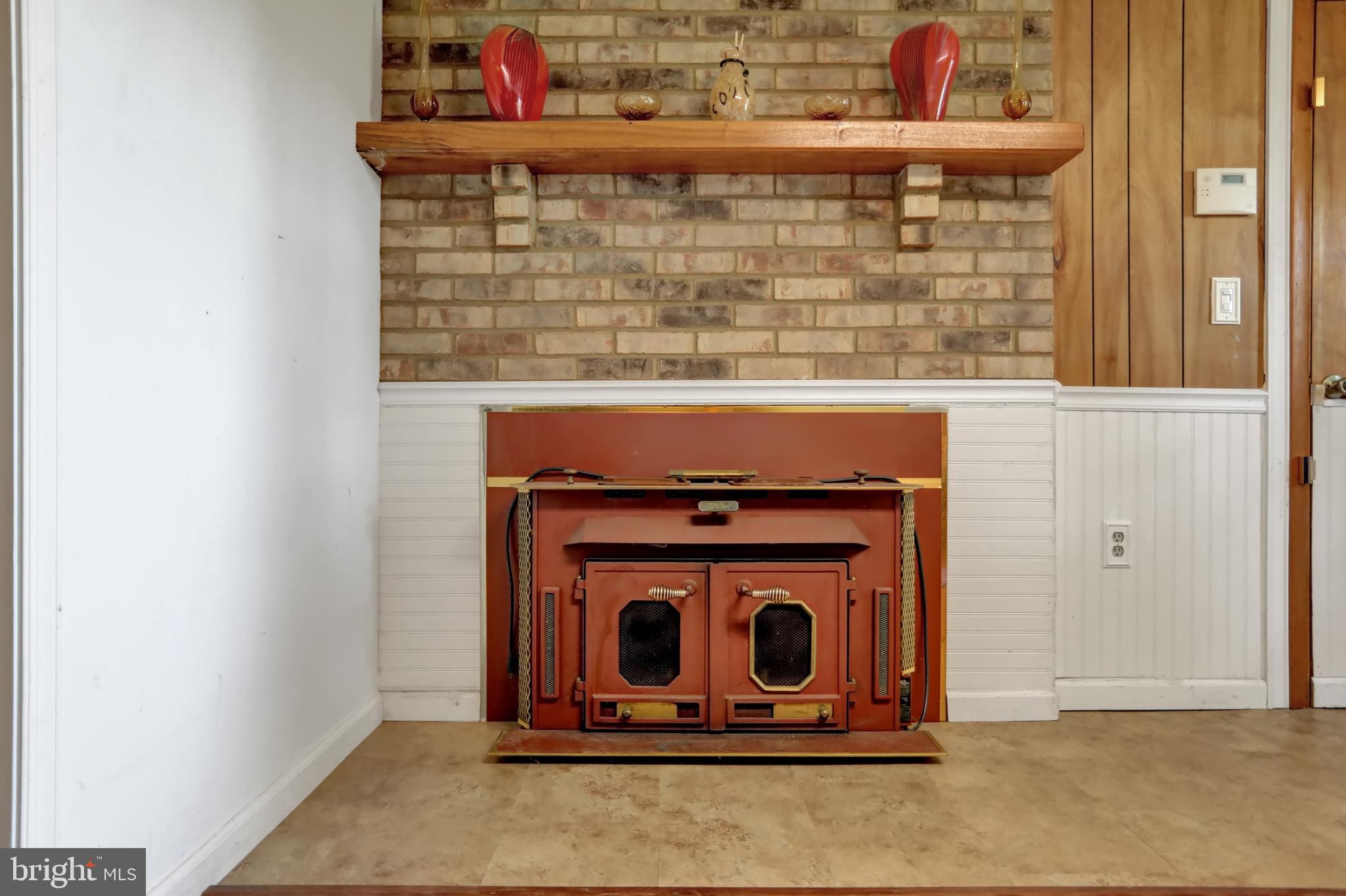 1004 South Stepney Road Aberdeen, MD 21001 - Photo 31 of 56 Lower Level Wood Burning Stove