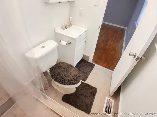 a bathroom with a sink and a toilet