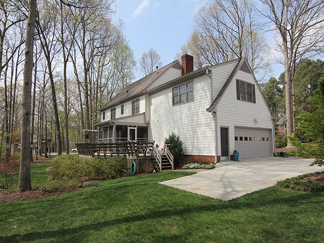 8013 Shellnut Road Raleigh, NC 27615 - Photo 25 of 25 Parking pad for guests and family. Driveway has newer concrete. Side-Entry Garage