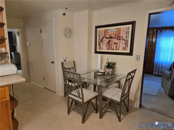 a view of a dining room with furniture