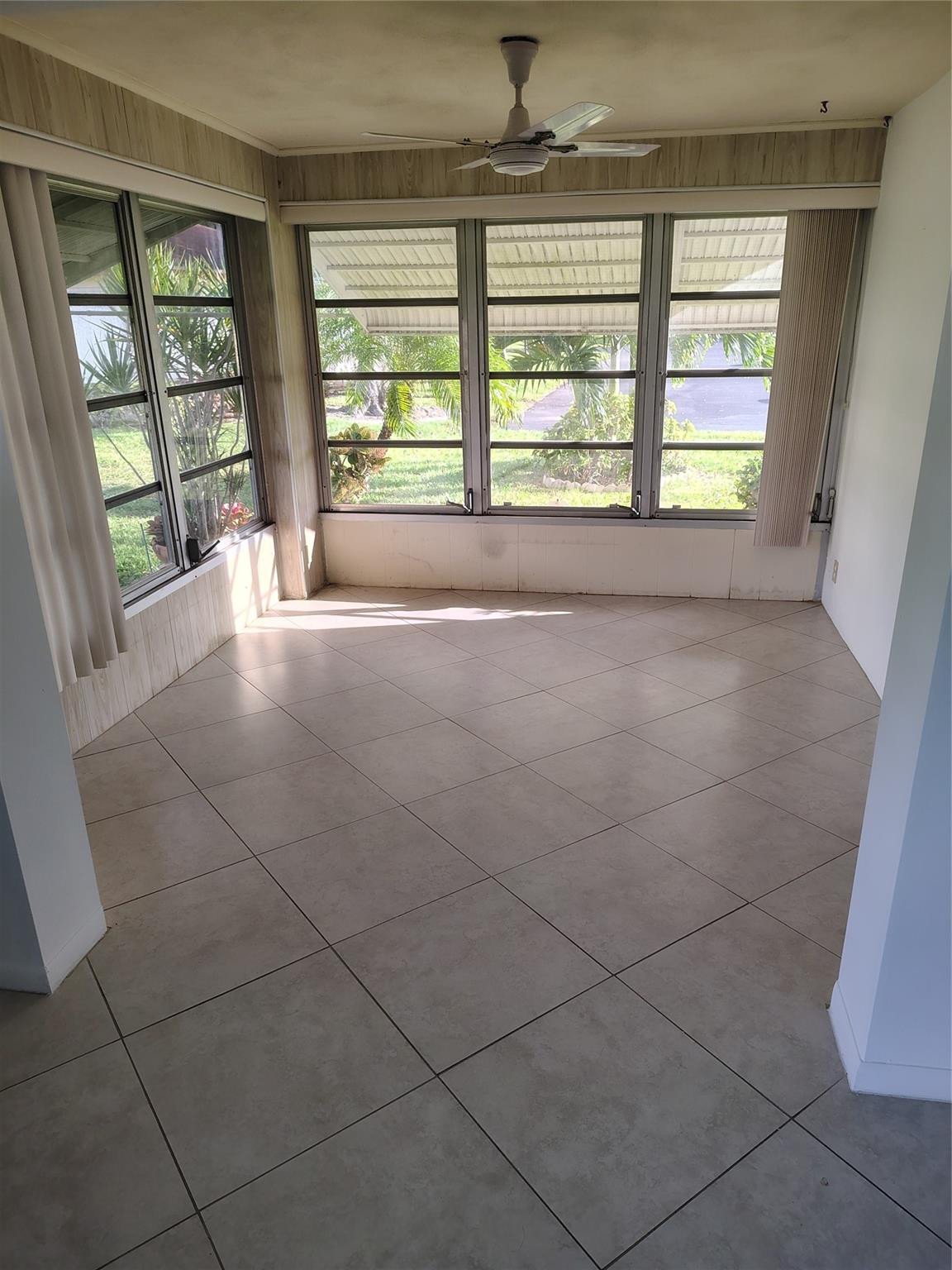 5245 Northwest 3rd Street, Unit D Delray Beach, FL 33445 - Photo 7 of 18 ENCLOSED SUN ROOM