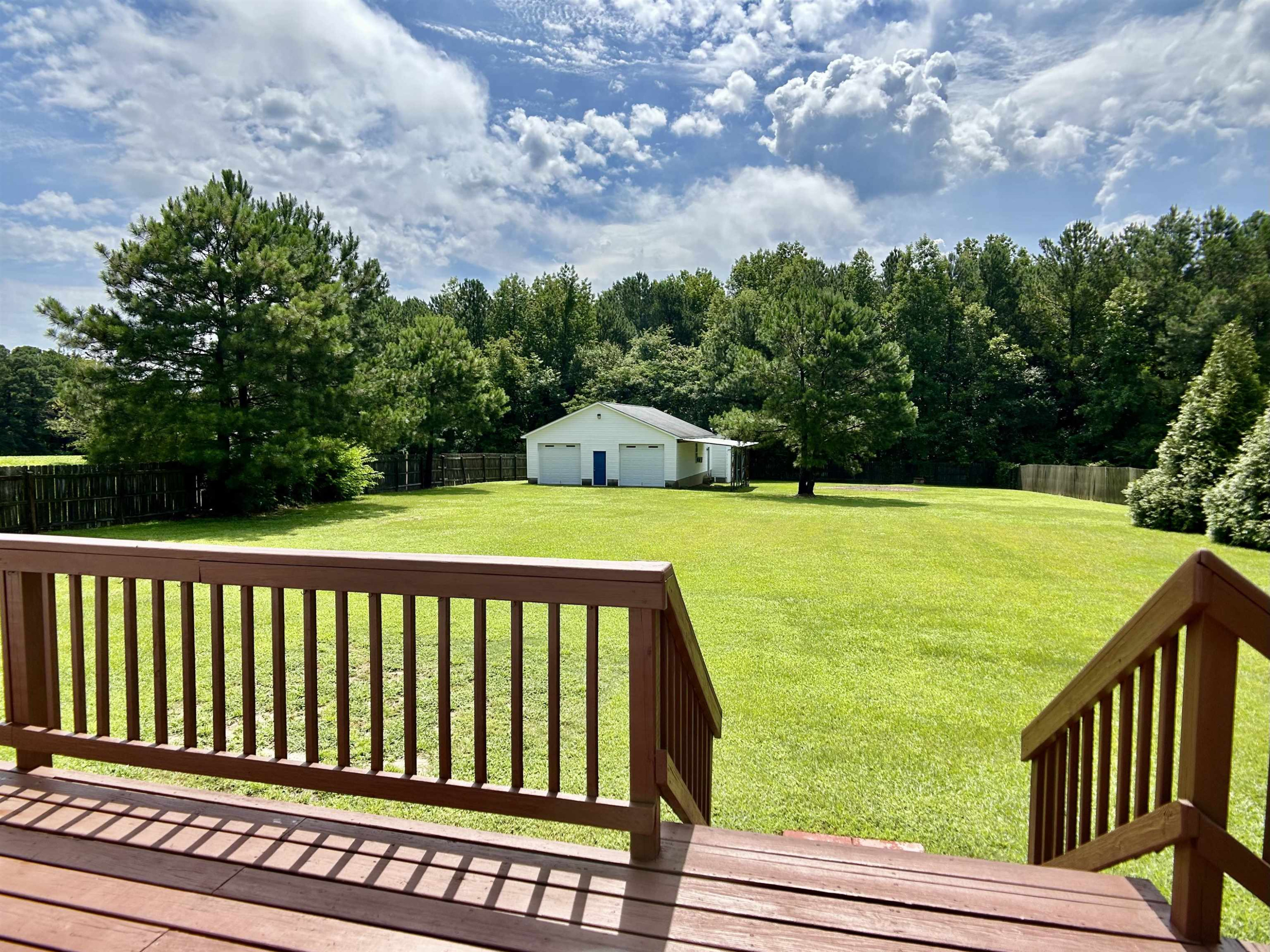 1931 Ranch Road Clayton, NC 27520 - Photo 20 of 34 a view of a swimming pool with a patio