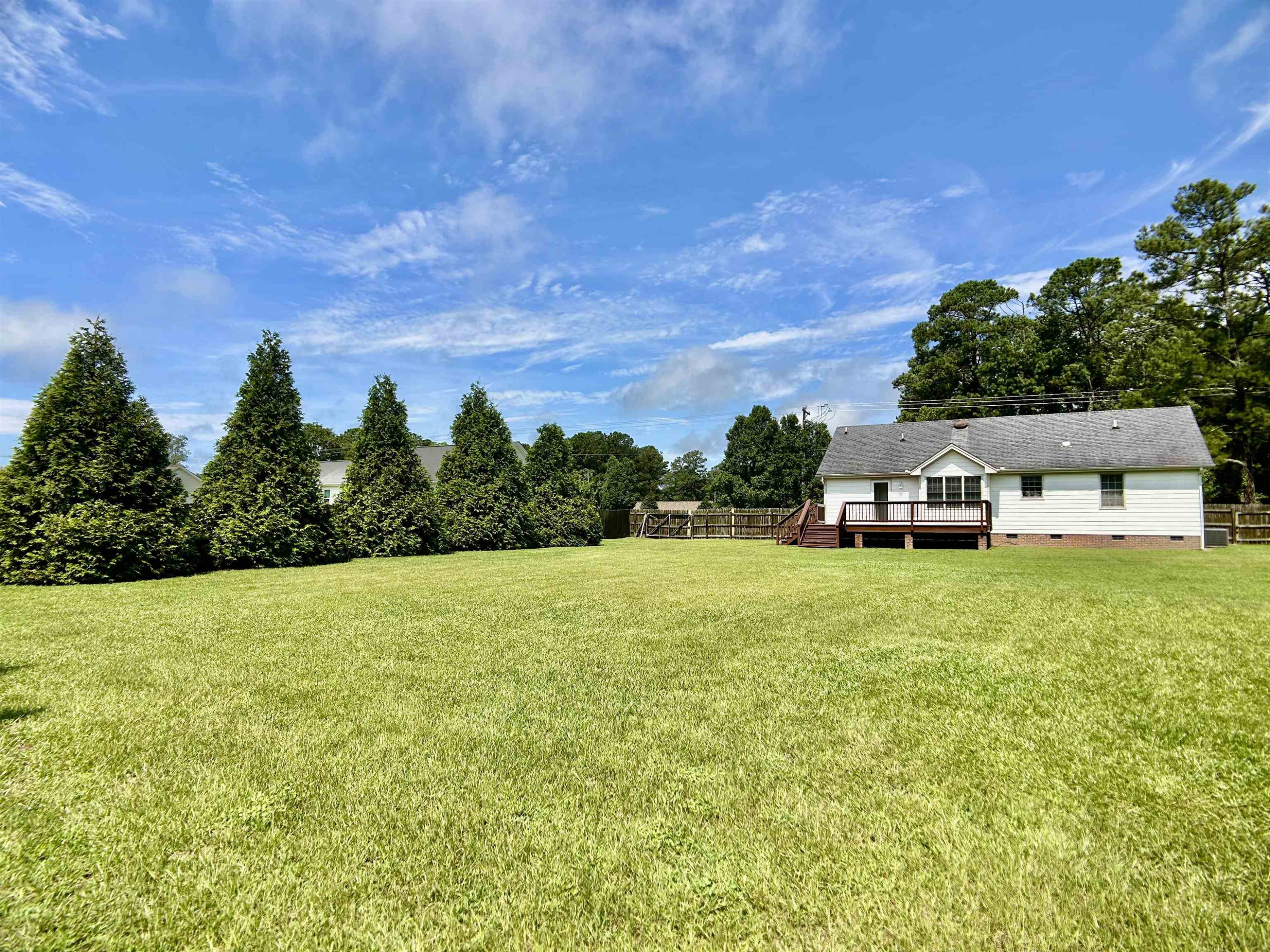 1931 Ranch Road Clayton, NC 27520 - Photo 23 of 34 a view of a house with a big yard