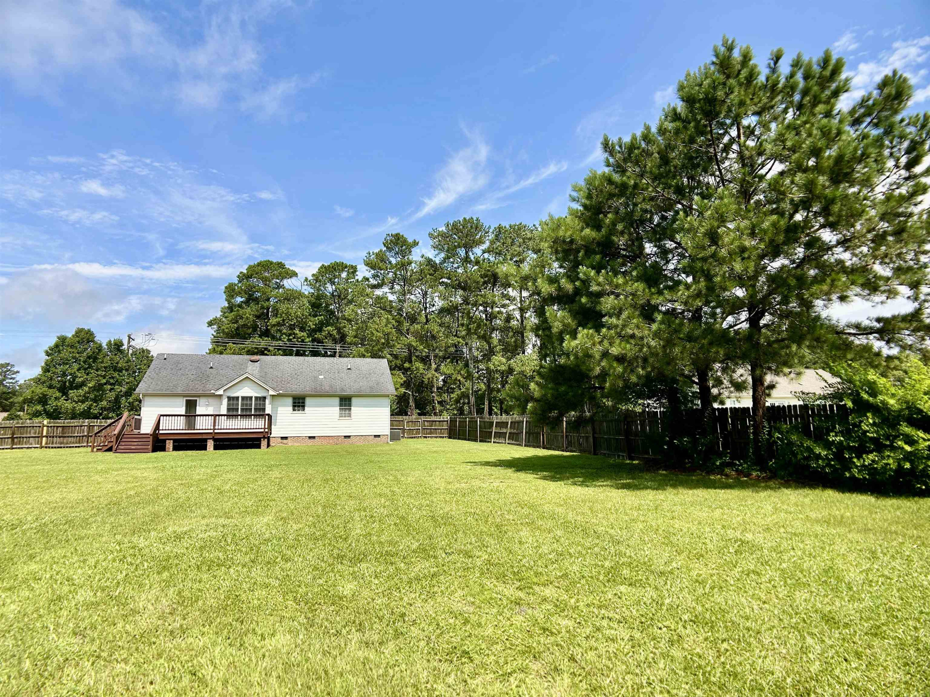 1931 Ranch Road Clayton, NC 27520 - Photo 33 of 34 a view of a house with a big yard