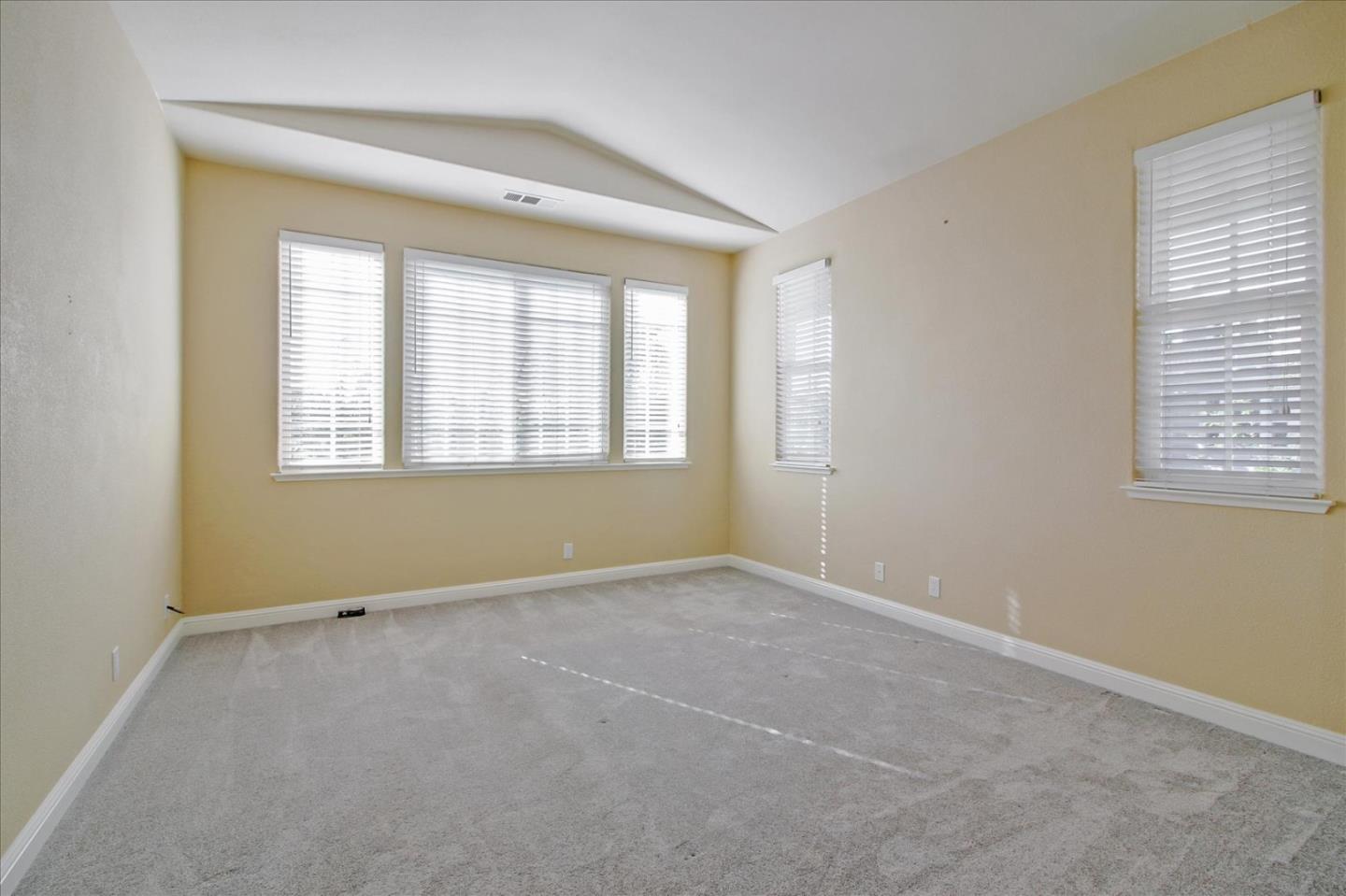 82 Cannery Circle Campbell, CA 95008 - Photo 19 of 35 a view of an empty room with a window