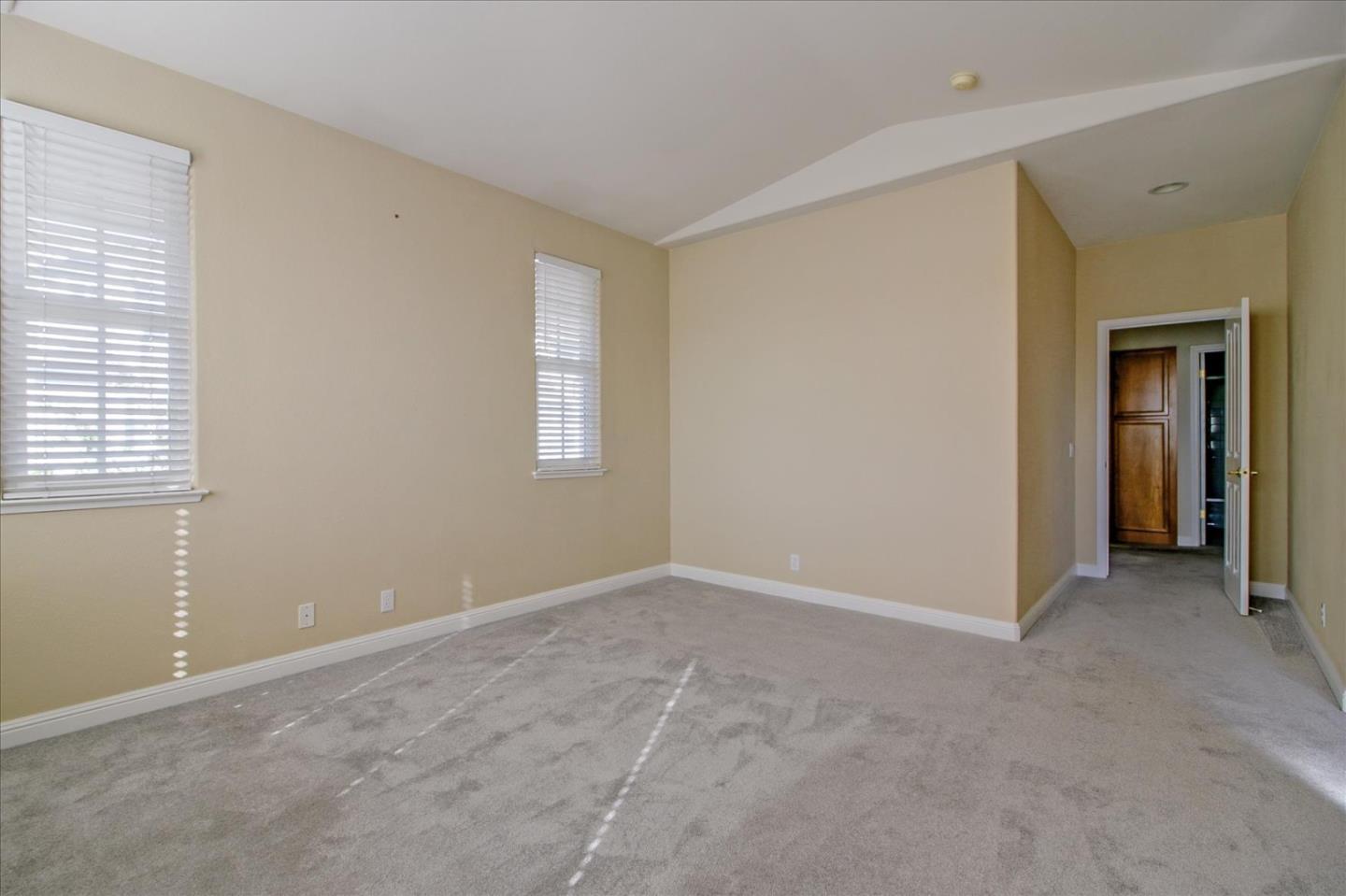82 Cannery Circle Campbell, CA 95008 - Photo 21 of 35 a view of an empty room with closet and a window