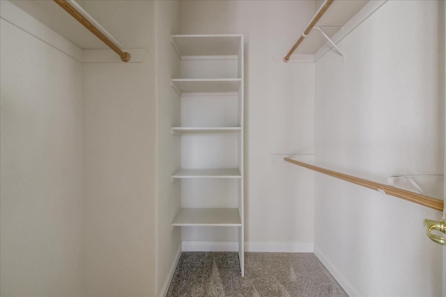 82 Cannery Circle Campbell, CA 95008 - Photo 22 of 35 a view of walk in closet with empty racks