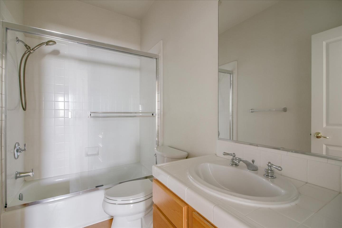 82 Cannery Circle Campbell, CA 95008 - Photo 27 of 35 a bathroom with a sink toilet and shower