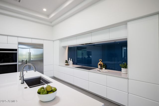 a bathroom with a sink and a bathtub