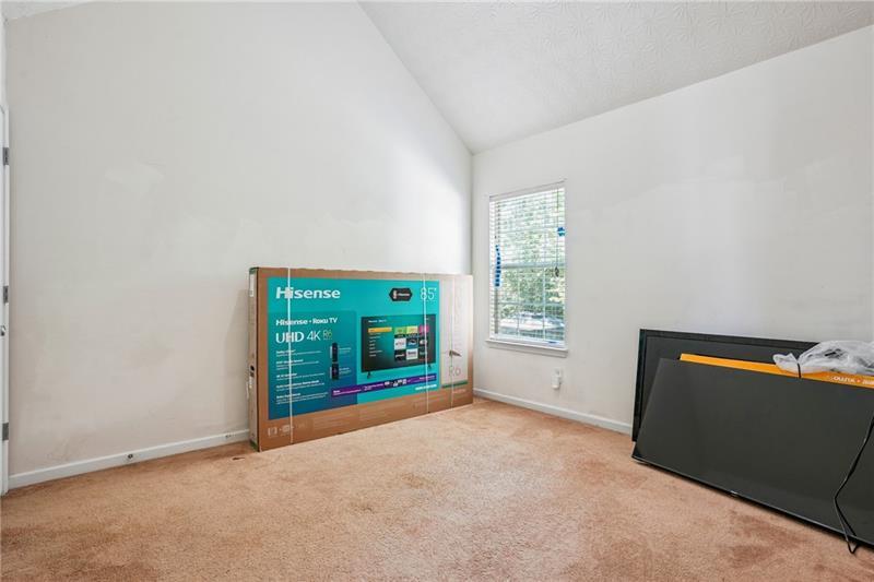 345 Timberlake Terrace Covington, GA 30016 - Photo 8 of 10 an empty room with windows