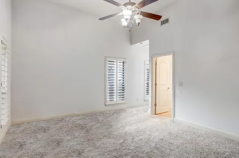 a bathroom with a sink double vanity and a mirror