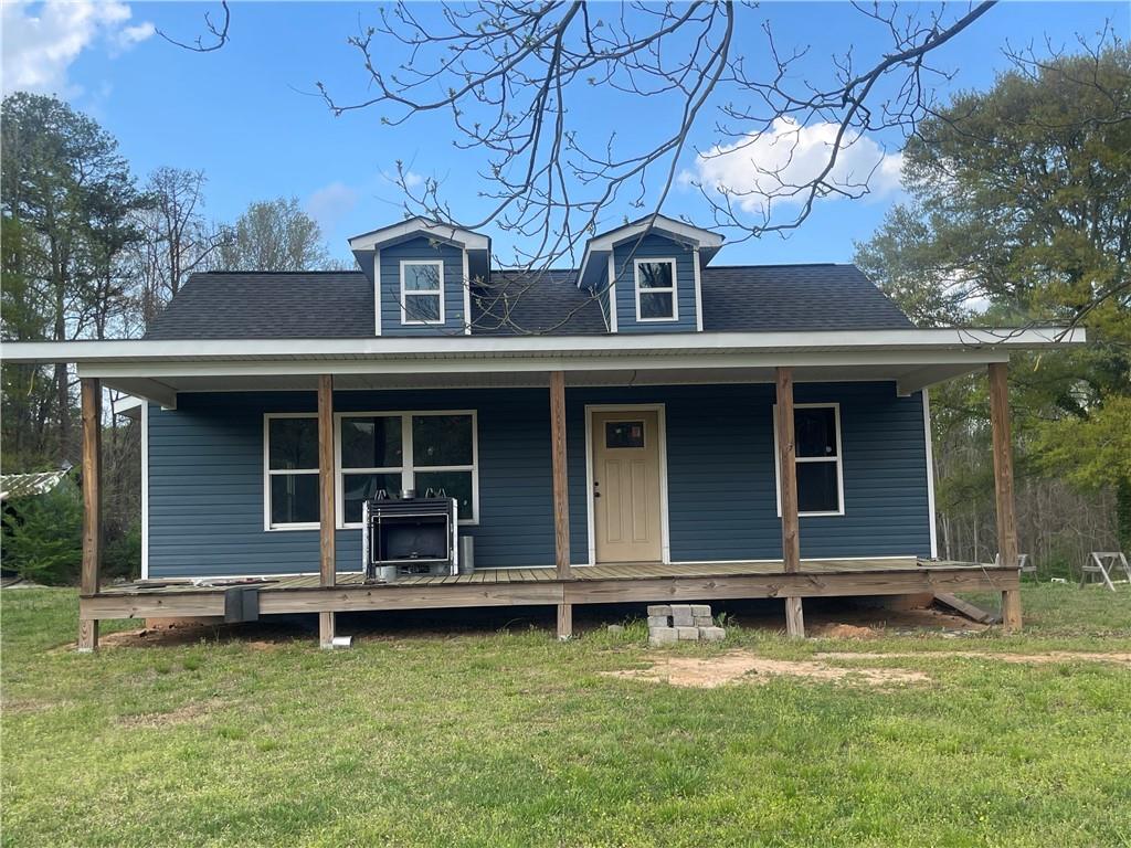 4390 Campbell Road Gainesville, GA 30507 - Photo 1 of 1 a front view of a house with a yard