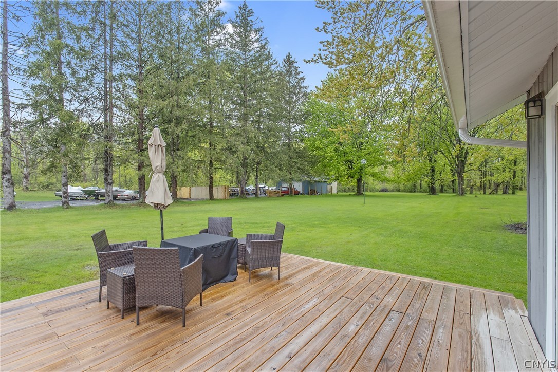 8355 Tuttle Road Cicero, NY 13030 - Photo 4 of 46 Enjoy the beautiful treed setting by the water.