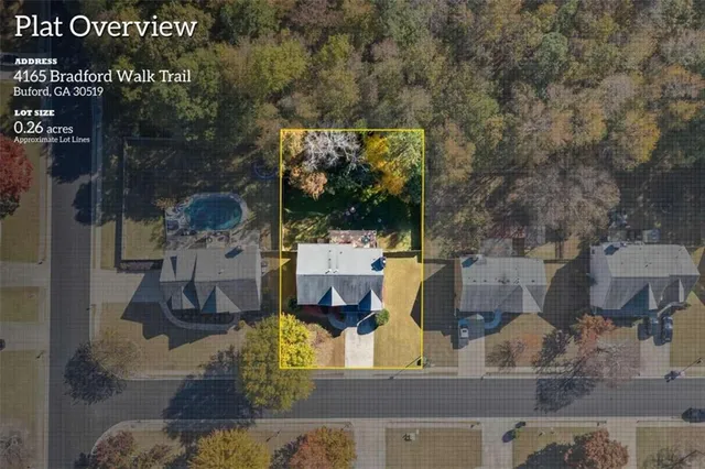 swimming pool view with a sitting space